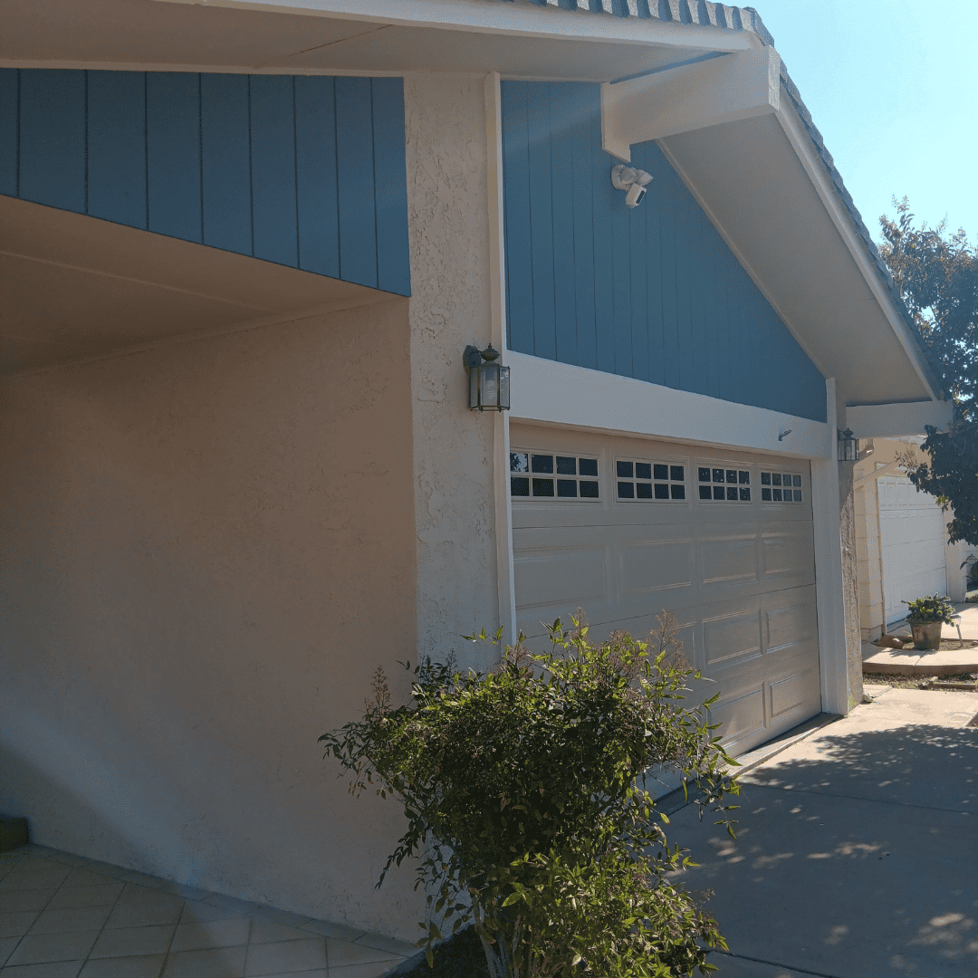 _Front Of AG Sons and painting new Blue home